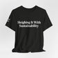 Sleighing it With Sustainability™ Unisex Holiday T-Shirt | Winter Wonderland White Text