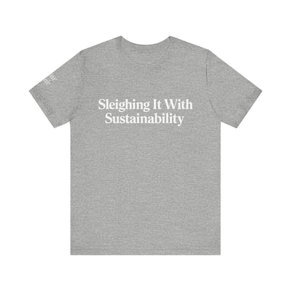 Sleighing it With Sustainability™ Unisex Holiday T-Shirt | Winter Wonderland White Text