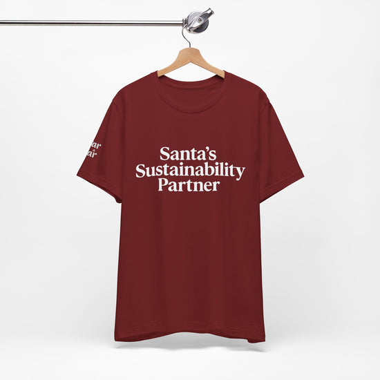 Santa’s Sustainability Partner™ Unisex Holiday T-Shirt | Winter Wonderland White Text